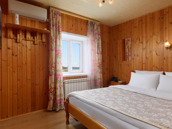 Фотография номера гостиницы У Святого Озера