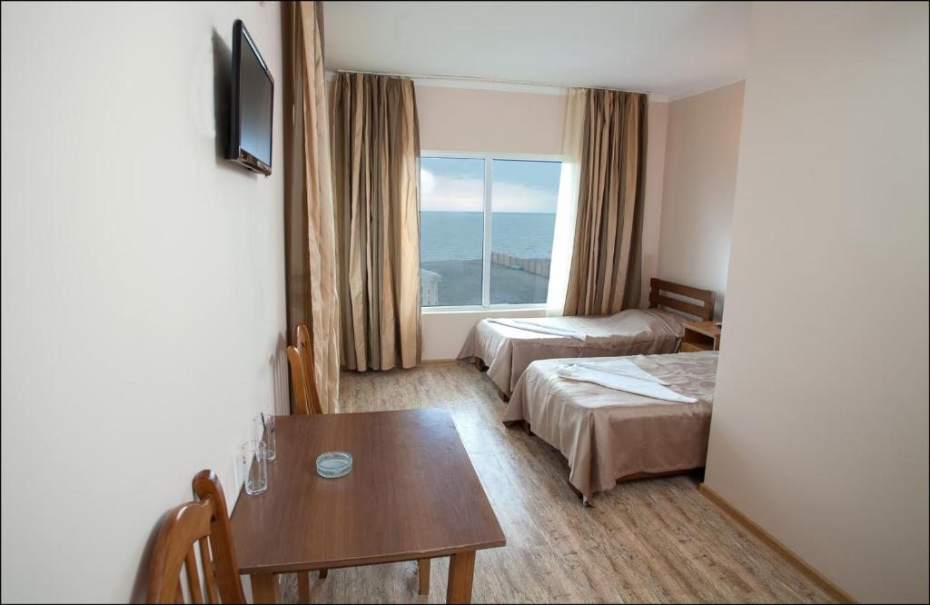 Двухместный (Двухместный номер Делюкс с 2 отдельными кроватями и видом на море) отеля Hotel Premium, Уреки