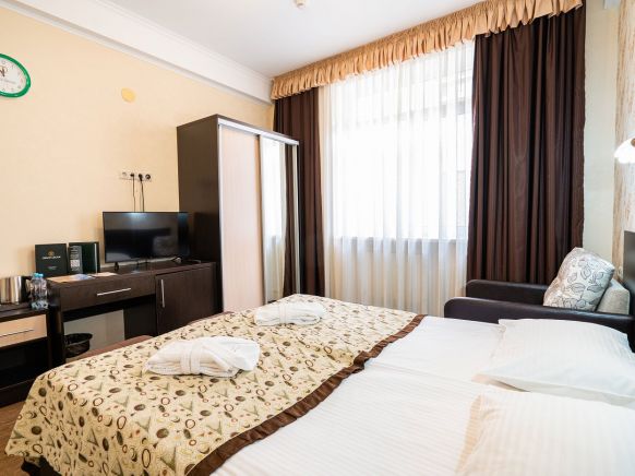 Фотография номера гостиницы Олимпия Красная Поляна