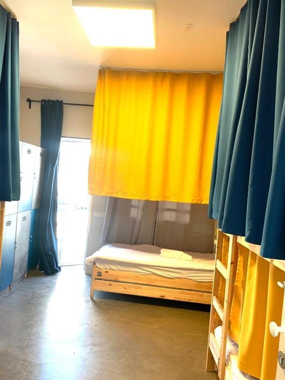 Номер (Кровать в общем 8-местном номере для мужчин и женщин), Pepo Hostel Tel Aviv