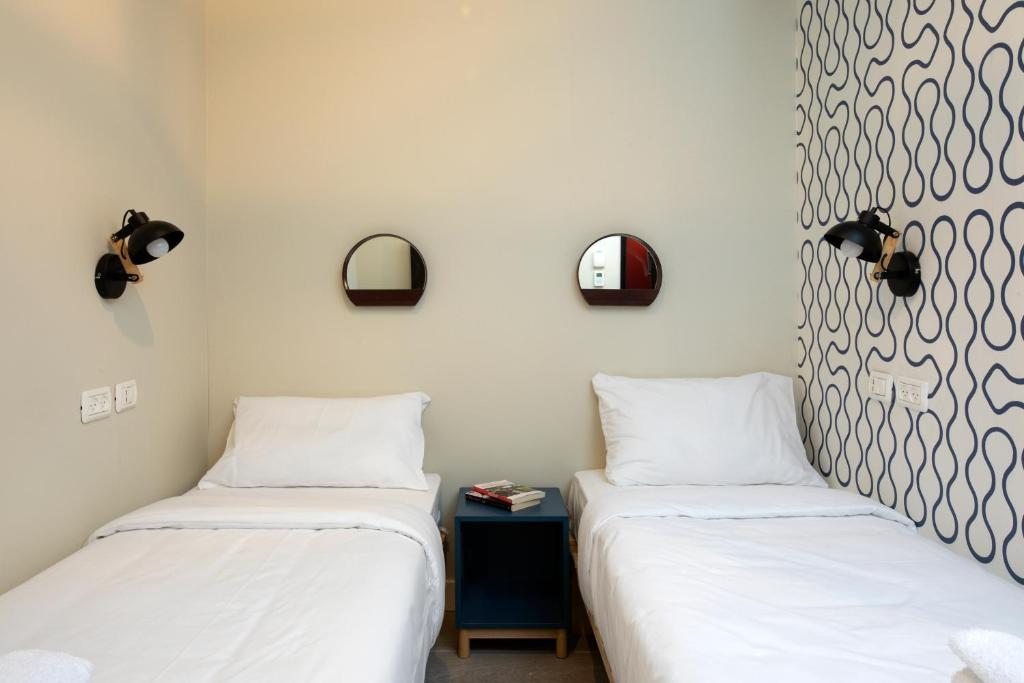 Двухместный (Двухместный номер с 2 отдельными кроватями) хостела The Spot Hostel, Тель-Авив