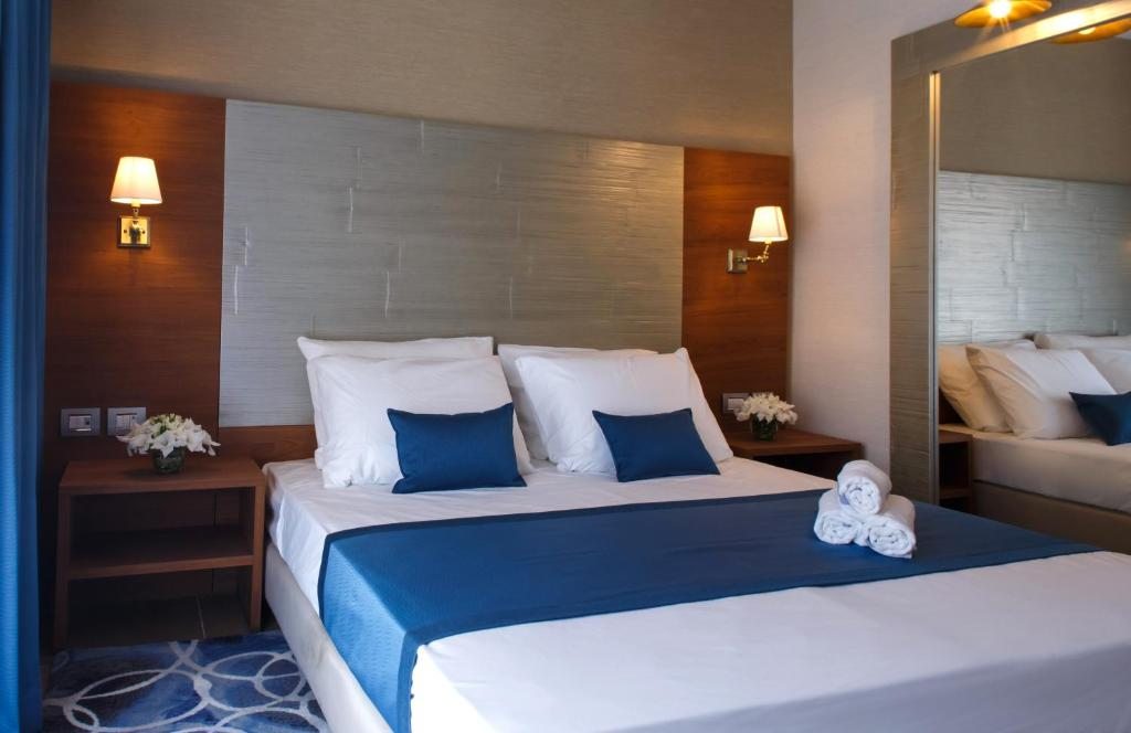 Двухместный (Стандартный двухместный номер с 1 кроватью или 2 отдельными кроватями) отеля AZIMUT Отель Меди Терре Нетания