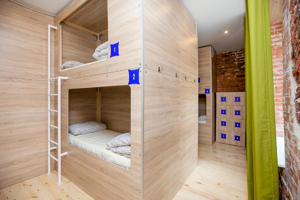 Капсула (Спальное место в капсуле в общем номере для мужчин и женщин с 8 кроватями) хостела Simple Italy, Санкт-Петербург