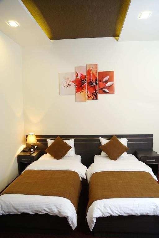 Двухместный (Просторный двухместный номер с 2 отдельными кроватями) отеля Tomu's, Гюмри