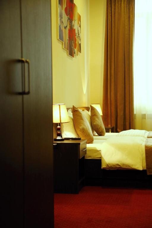 Двухместный (Двухместный номер Делюкс с 1 кроватью или 2 отдельными кроватями) отеля Tomu's, Гюмри