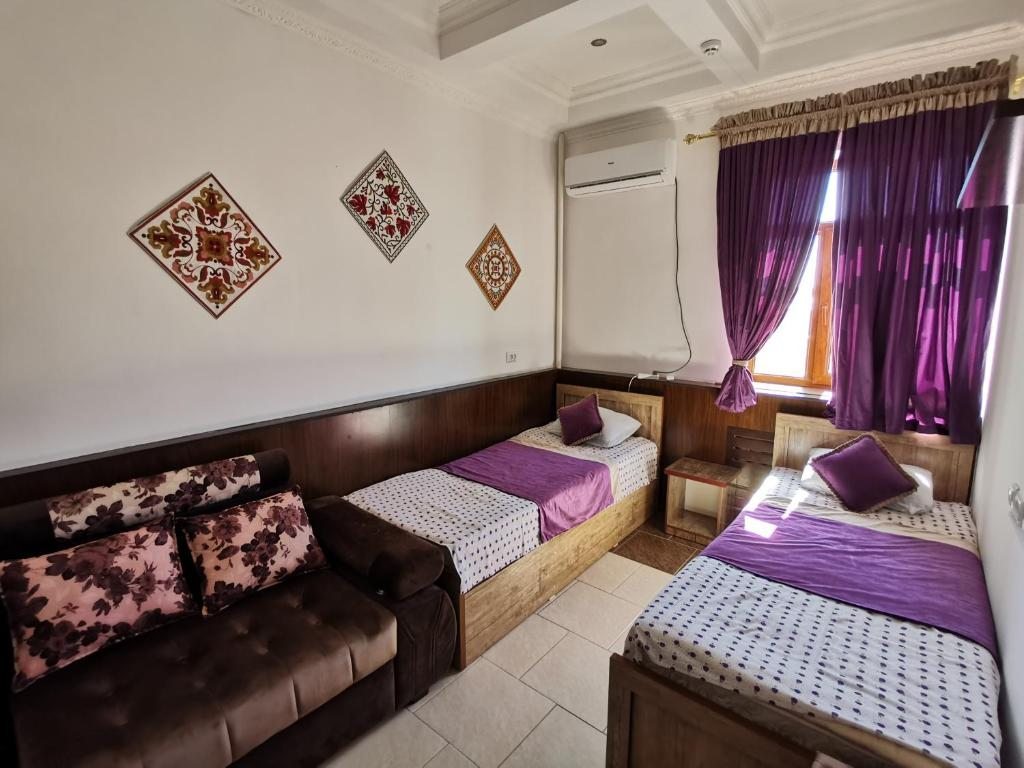 Номер (Односпальная кровать в общем номере с 2 кроватями) хостела BESQALA, Нукус