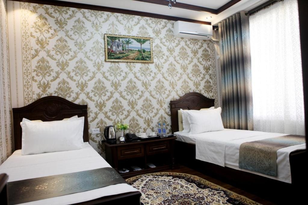 Двухместный (Стандартный двухместный номер с 2 отдельными кроватями) отеля Hotel Naxshab, Карши