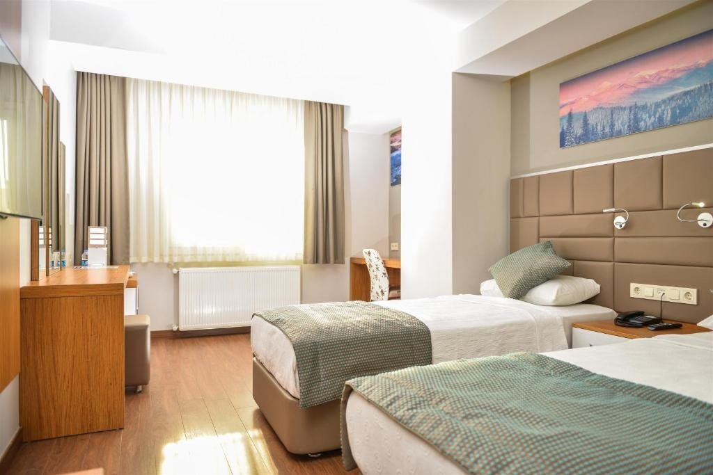 Двухместный (Стандартный двухместный номер с 1 кроватью или 2 отдельными кроватями) отеля Hakcan Hotel, Измир
