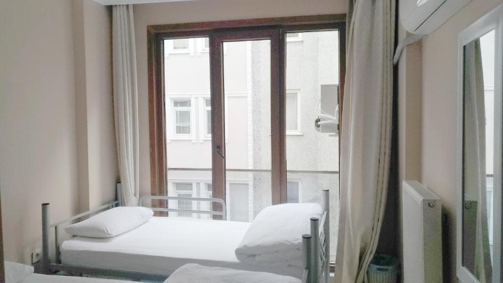 Двухместный (Стандартный двухместный номер с 2 отдельными кроватями) хостела Kevin's Hostel Yeldeğirmeni, Стамбул