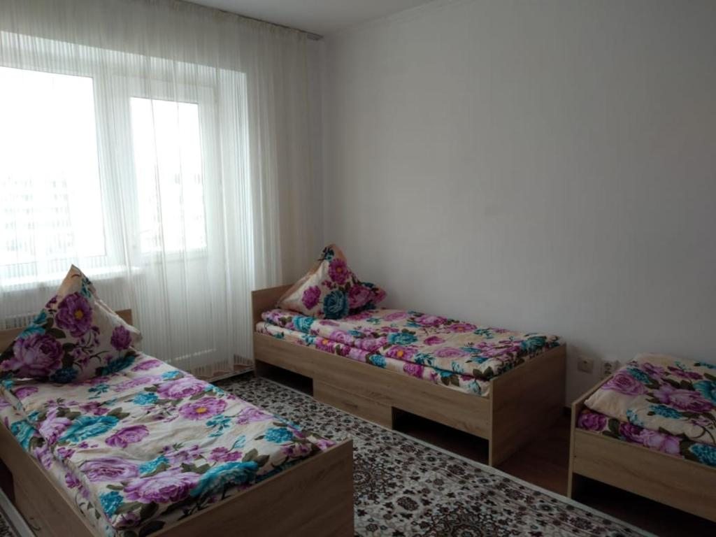 Двухместный (Двухместный номер с 2 отдельными кроватями и собственной ванной комнатой) хостела Medet Hostel, Актау