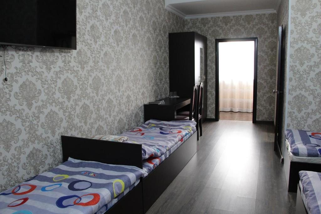 Номер (Кровать в общем 4-местном номере для мужчин и женщин) отеля Букпа, Караганда