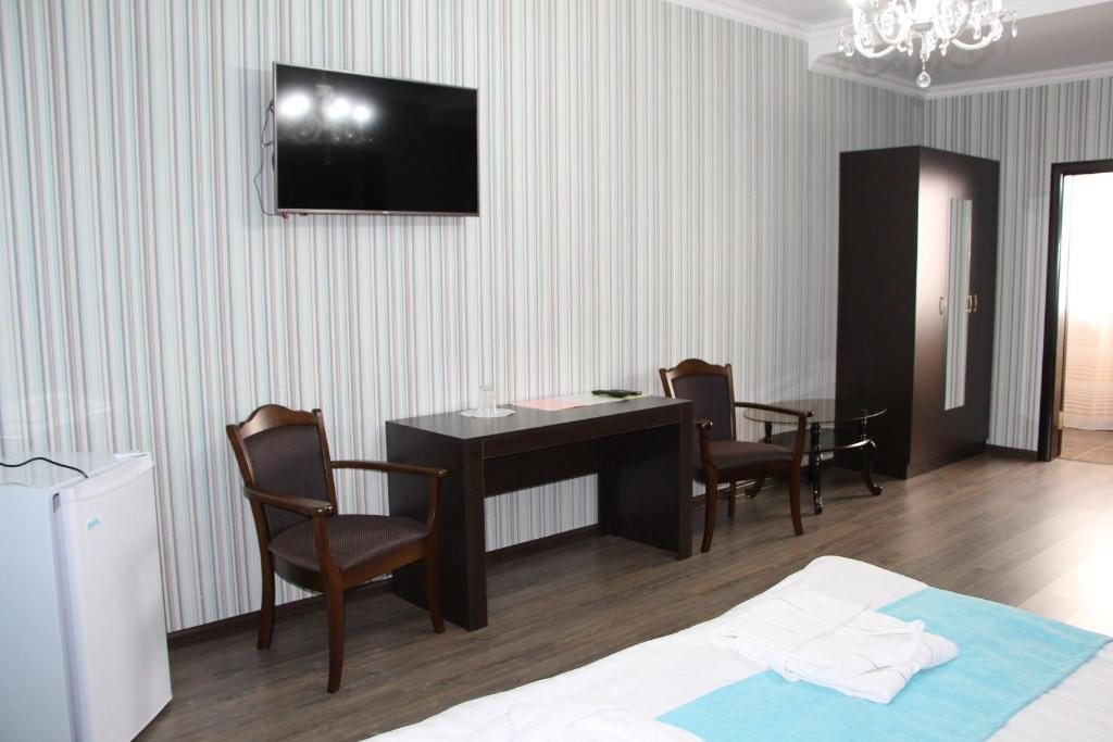Сьюит (Люкс с кроватью размера «king-size») отеля Букпа, Караганда