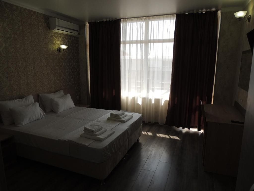 Двухместный (Улучшенный двухместный номер с 1 кроватью или 2 отдельными кроватями и видом на море) гостевого дома Бастион, Ольгинка