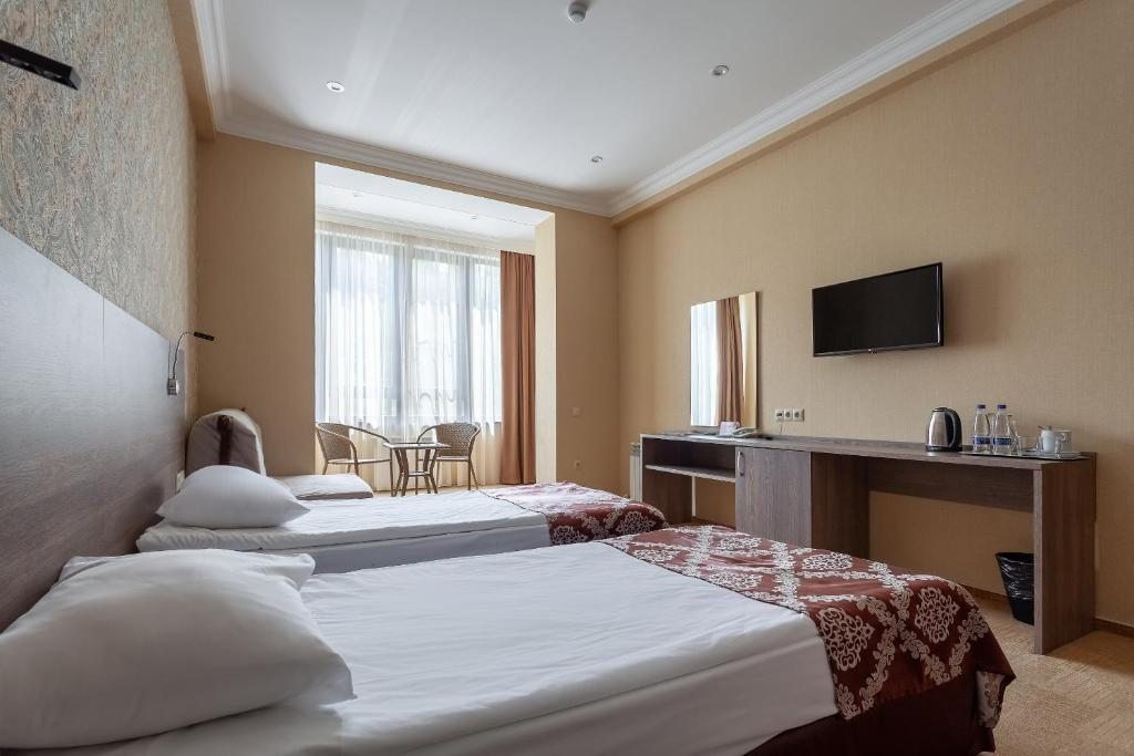 Двухместный (Стандартный двухместный номер с 2 отдельными кроватями) отеля Планета Спорт, Дагомыс
