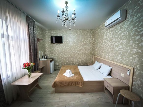 Фотография номера гостевого дома Зима-Лето