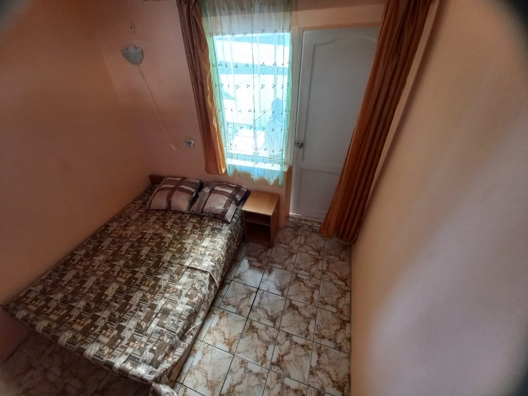 Двухместный (Бюджетный двухместный номер с 2 отдельными кроватями) мини-отеля На Черноморской 100, Витязево