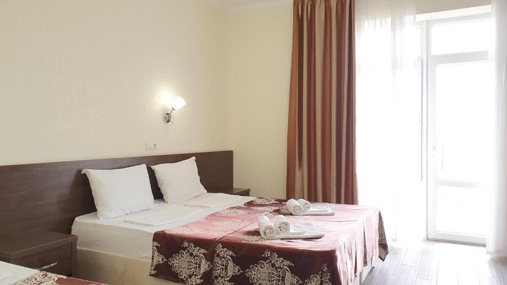 Двухместный (Двухместный номер с 1 кроватью или 2 отдельными кроватями и балконом) отеля Маг, Витязево
