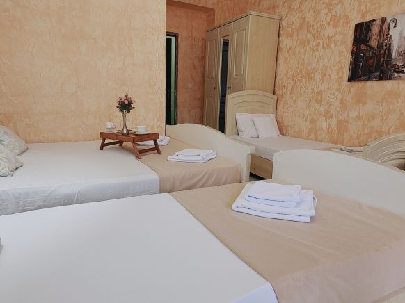 Фотография номера гостевого дома Золотой берег