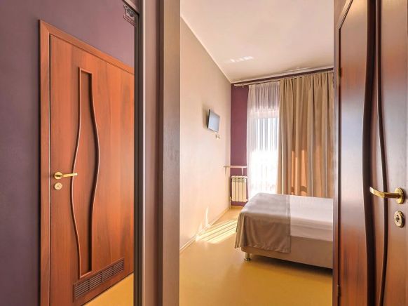 Фотография номера гостевого дома Дом Путешественника