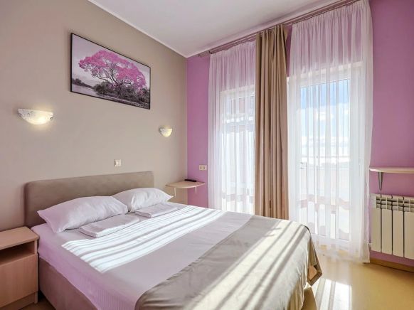 Фотография номера гостевого дома Дом Путешественника