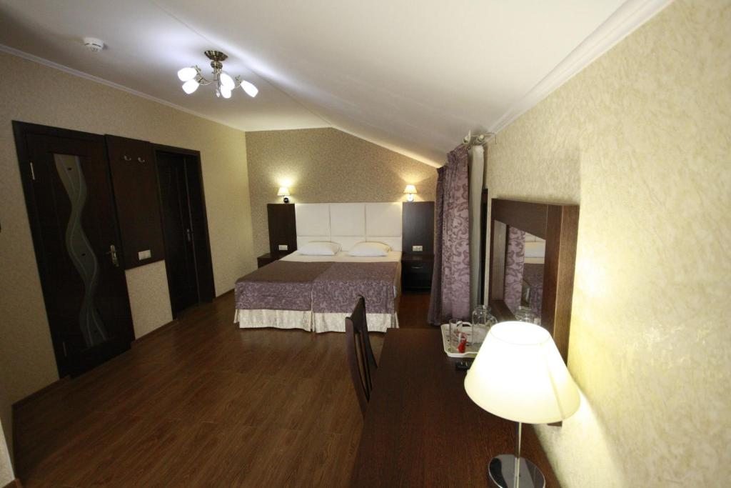 Двухместный (Двухместный номер с 1 кроватью и дополнительной кроватью - Мансарда) отеля Мечта, Геленджик
