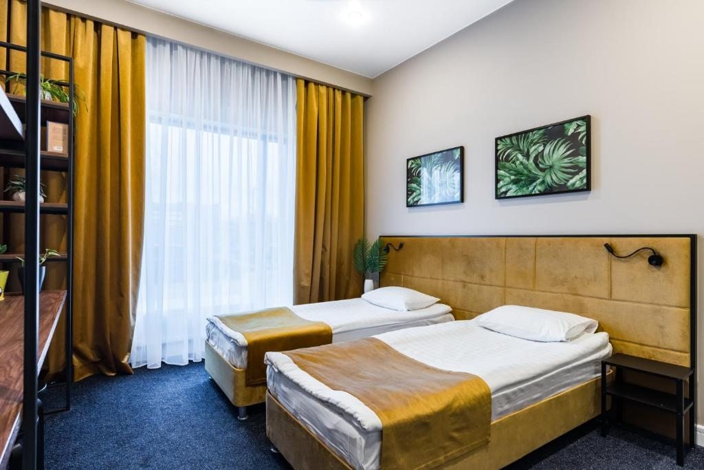 Двухместный (Стандартный двухместный номер с 2 отдельными кроватями) отеля Green loft, Санкт-Петербург