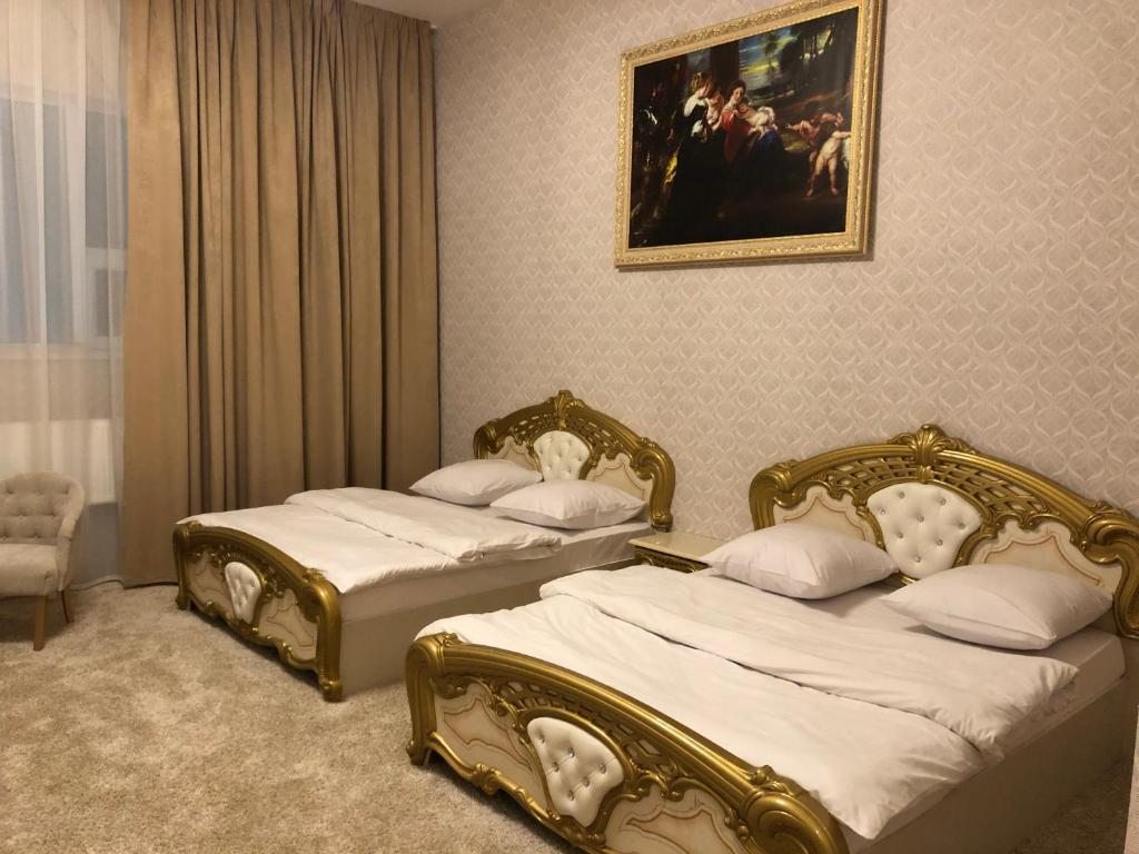 Двухместный (Просторный двухместный номер с 2 отдельными кроватями) отеля Перово Плаза, Москва