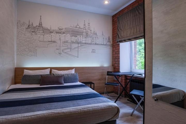 Двухместный (Улучшенный двухместный номер с 1 кроватью или 2 отдельными кроватями и видом на сад) отеля Якиманка 38, Москва