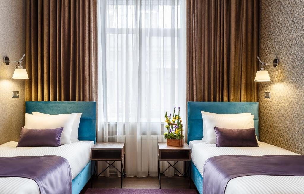 Двухместный (Двухместный номер Comfort с двумя односпальными кроватями) мини-отеля Мансилион, Москва
