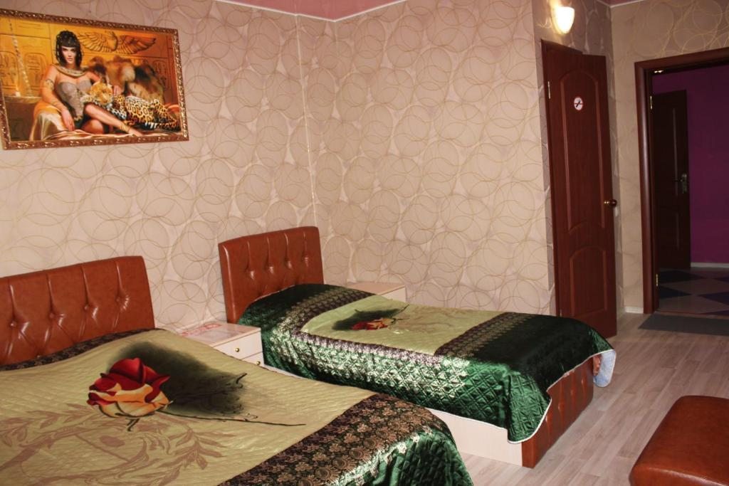 Двухместный (Просторный двухместный номер с 2 отдельными кроватями) отеля Уют на Рудневке, Москва