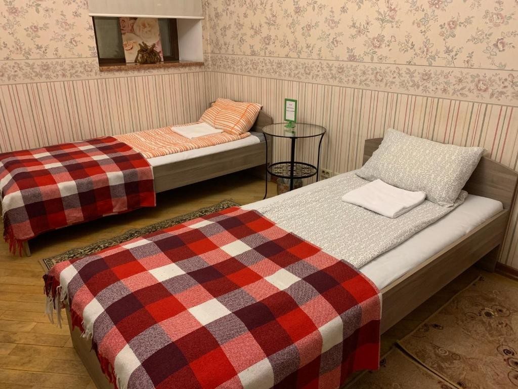 Двухместный (Двухместный номер с 2 отдельными кроватями и общей ванной комнатой) отеля Мини-Отель Фламинго Тульская, Москва