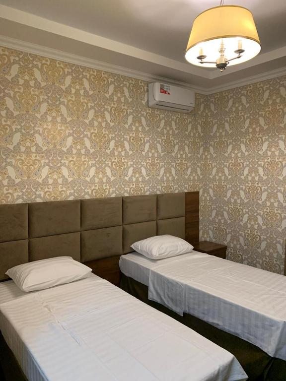Двухместный (Стандартный двухместный номер с 2 отдельными кроватями) отеля Империя, Волгоград