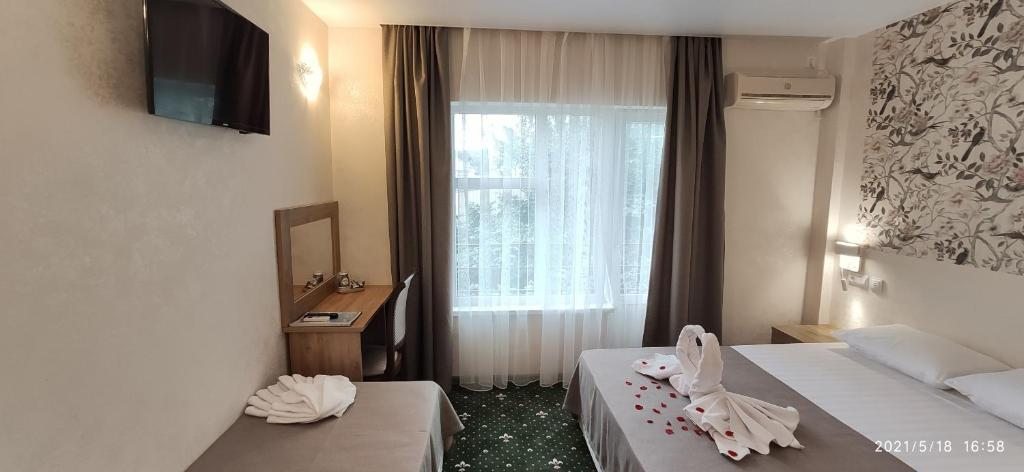 Двухместный (Улучшенный двухместный номер с 1 кроватью), Отель H2O