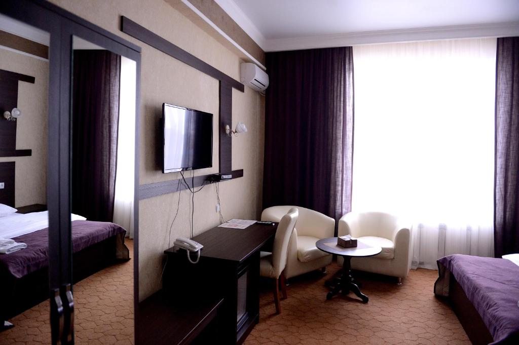 Гостиницы тараз. Отель Прайд номера. Гостиницы в городе Тараз Казахстан. Тараз гостиница Джамбул. Фото гостиница Джамбул.