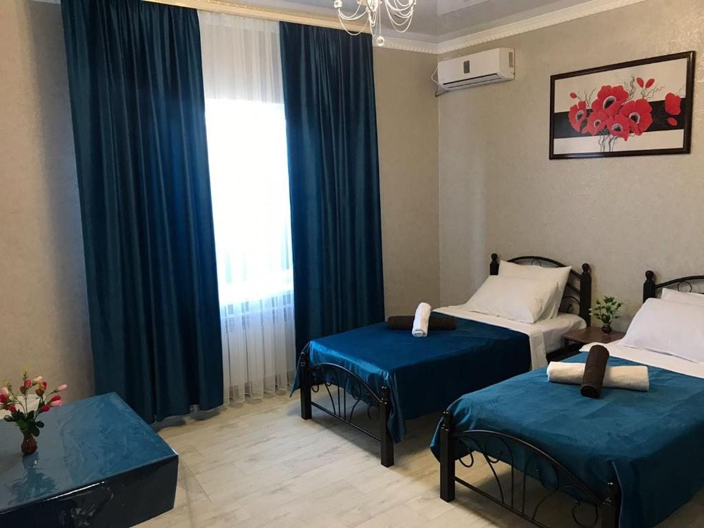 Двухместный (Просторный двухместный номер с 2 отдельными кроватями) отеля Бархат, Актобе