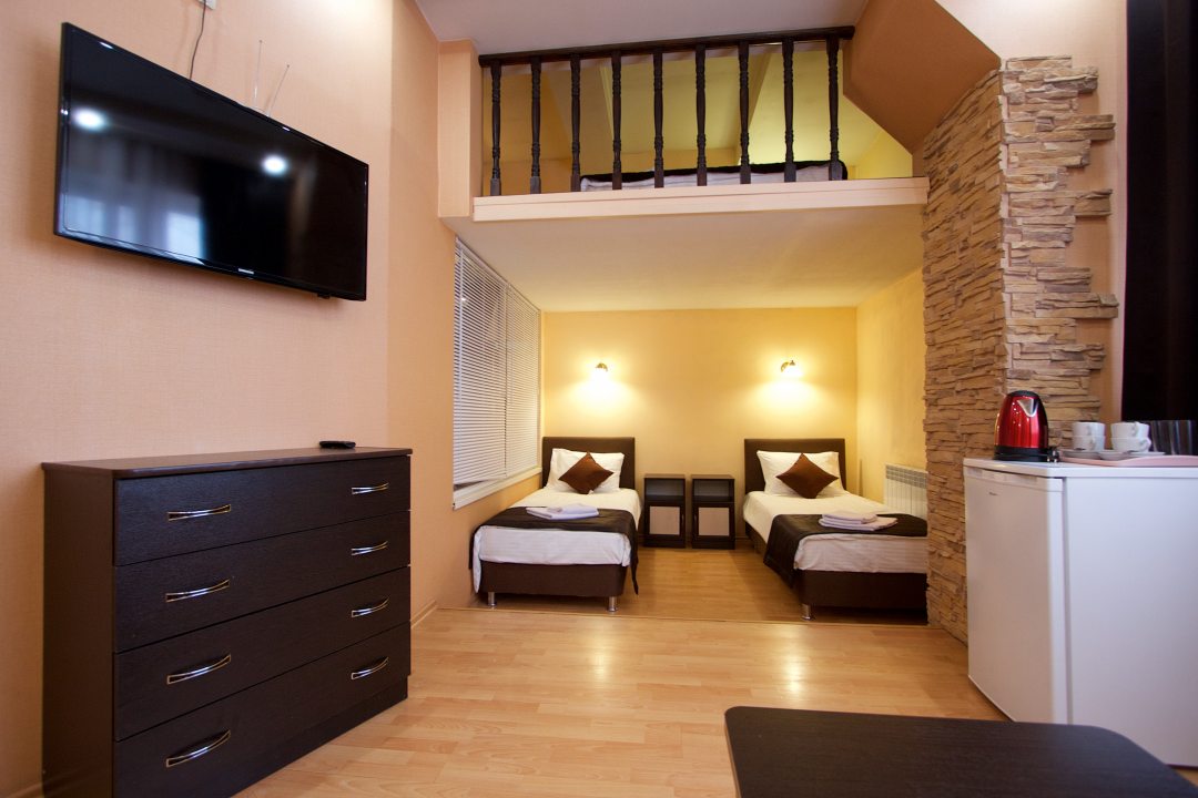 Четырехместный (Комфорт+ 4-х местный с 2 двуспальными кроватями или 1 двуспальной и 2 раздельными кроватями) отеля Автодвор, Рязань
