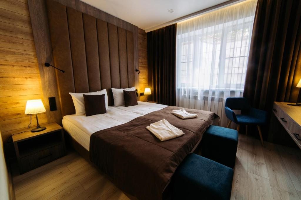 Двухместный (Двухместный номер с 1 кроватью или 2 отдельными кроватями и ванной комнатой) отеля Веранда, Смоленск