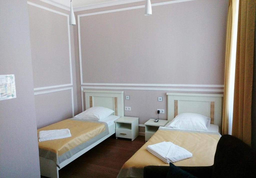 Двухместный (Двухместный номер с 2 отдельными кроватями и душем) отеля Березка, Солигорск