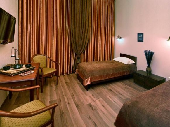 Фотография номера мини отеля Капитель