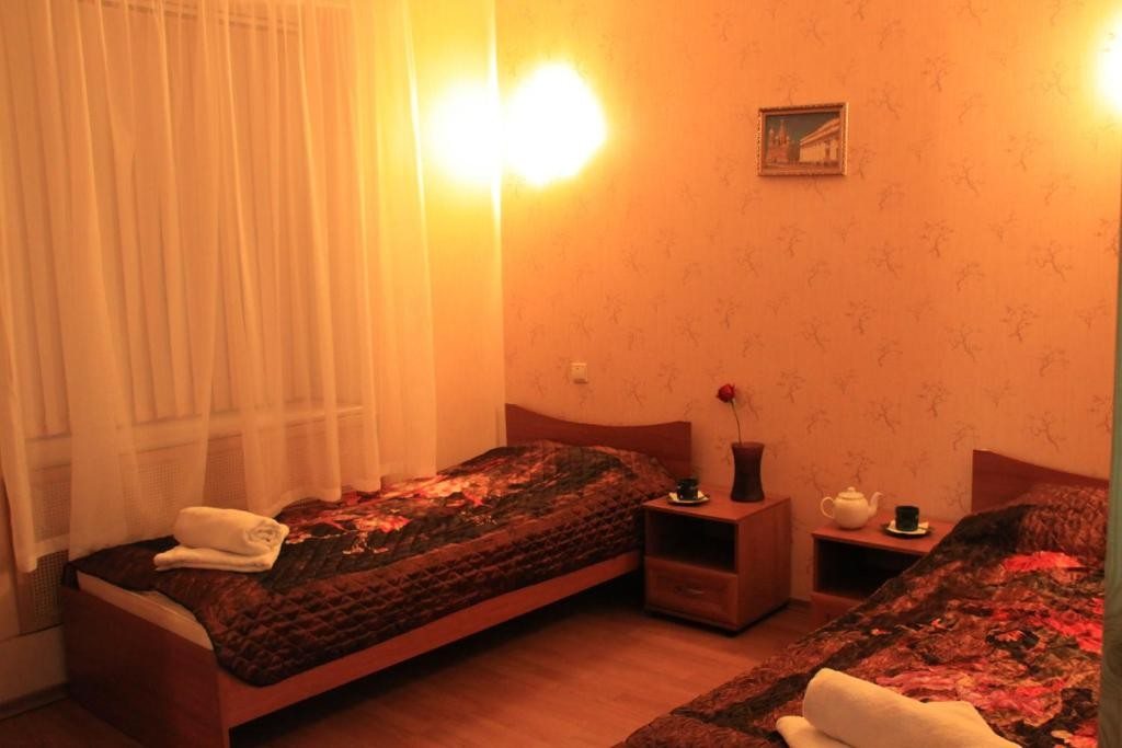 Двухместный (Двухместный номер эконом-класса с 2 отдельными кроватями и общей ванной комнатой) мини-отеля На Шмидта, Санкт-Петербург