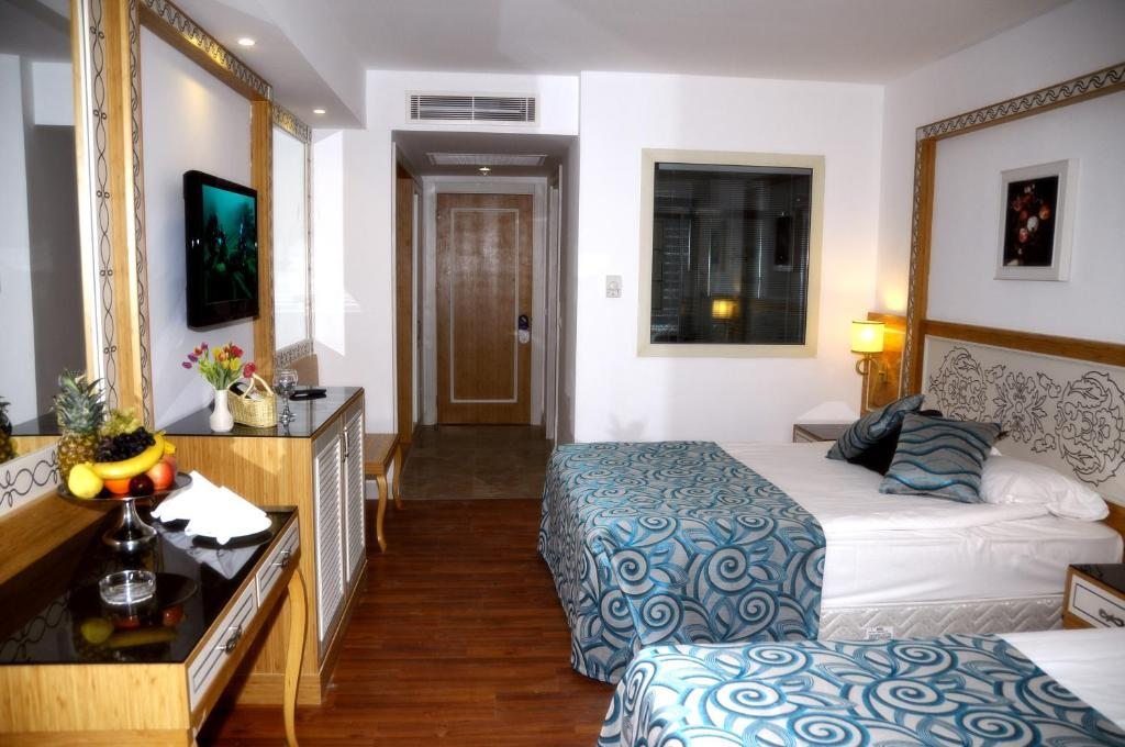 Двухместный (Двухместный номер с 1 кроватью или 2 отдельными кроватями и боковым видом на море) курортного отеля Crystal Waterworld Resort & Spa, Белек