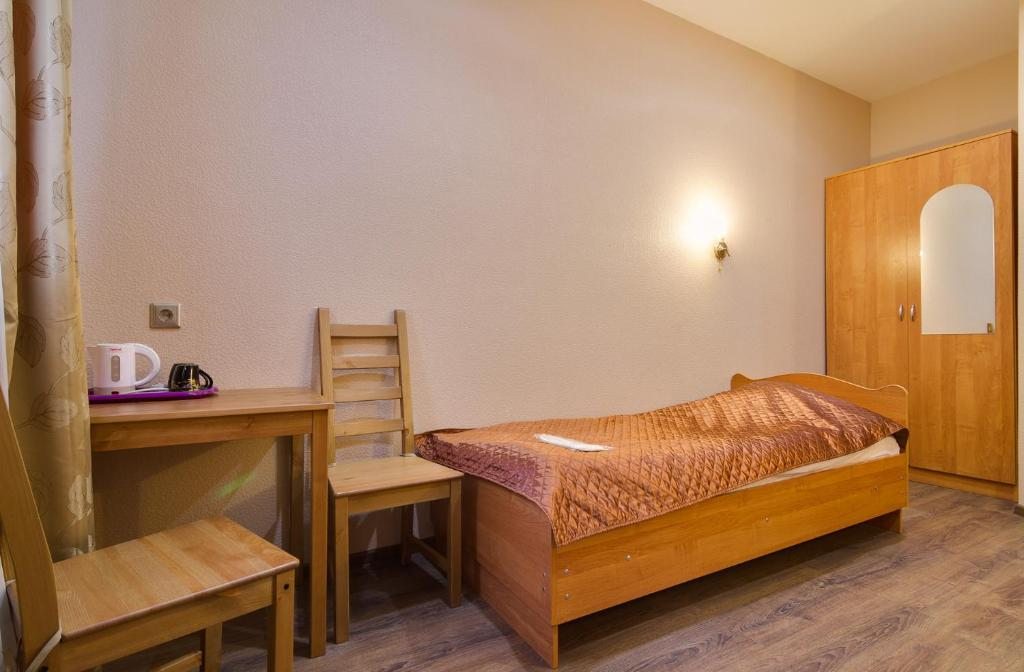 Двухместный (Двухместный номер с 2 отдельными кроватями и собственной ванной комнатой) мини-отеля Аллан, Санкт-Петербург