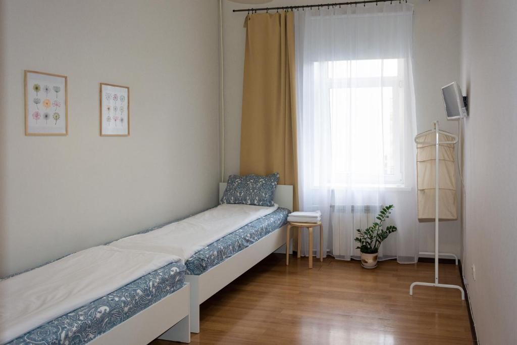 Двухместный (Бюджетный двухместный номер с 2 отдельными кроватями) гостевого дома Лиговский, Санкт-Петербург