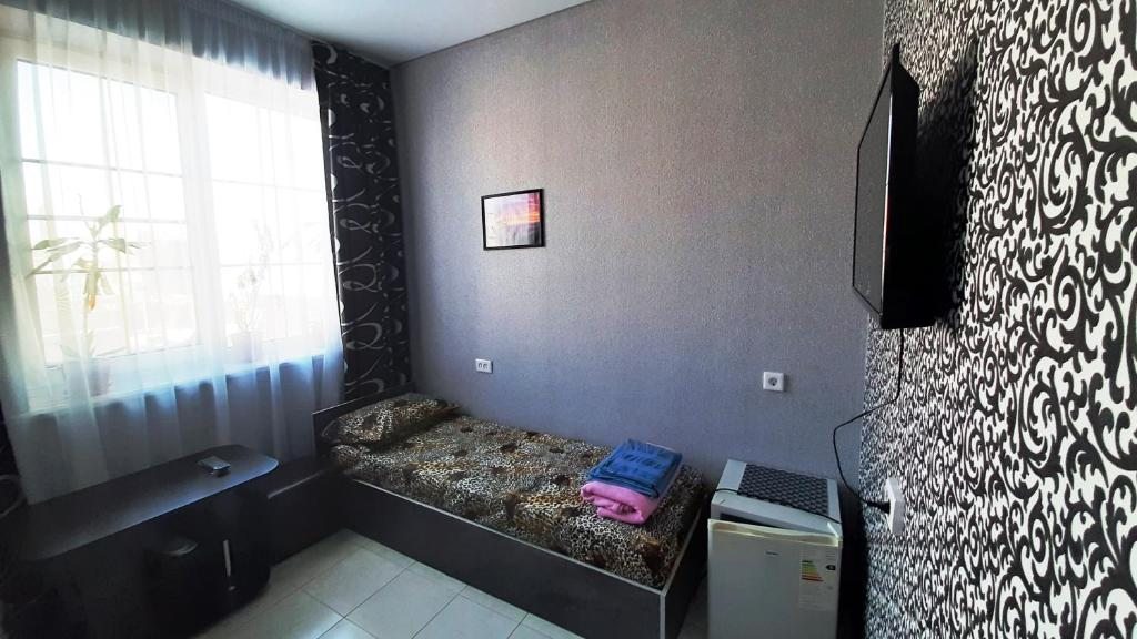 Двухместный (Стандартный двухместный номер с 1 кроватью или 2 отдельными кроватями) отеля Арбат, Батайск