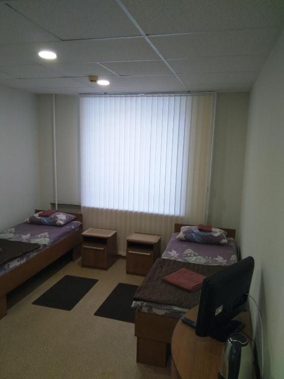 Двухместный (Двухместный номер с 2 отдельными кроватями и ванной комнатой) отеля Эспланада, Пермь