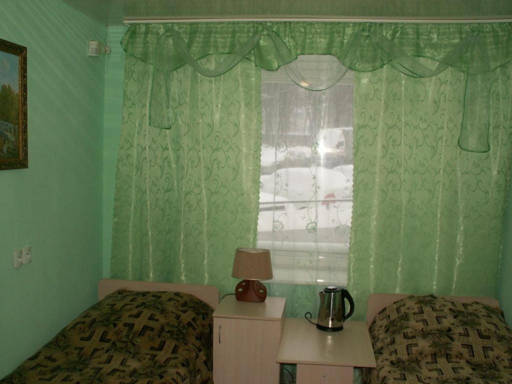 Двухместный (Двухместный номер с 1 кроватью или 2 отдельными кроватями, общая ванная комната) отеля Успех, Уфа