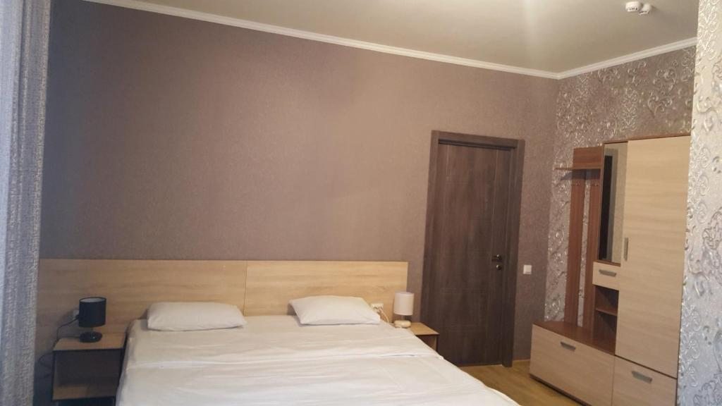 Двухместный (Улучшенный двухместный номер с 1 кроватью) отеля City M, Саратов