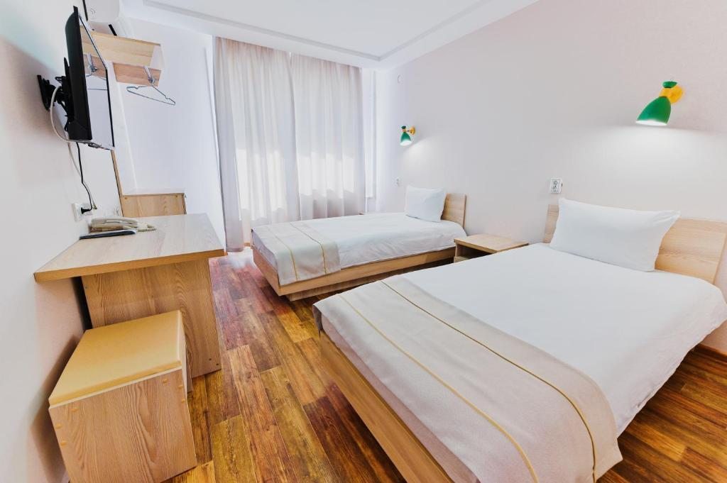 Двухместный (Стандартный двухместный номер с 2 отдельными кроватями) спа-отеля City Park Hotel на Октябрьской, Улан-Удэ