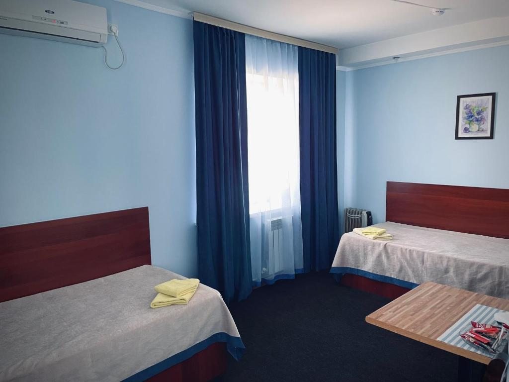 Двухместный (Двухместный номер с 2 отдельными кроватями) отеля На Сумской, Белгород