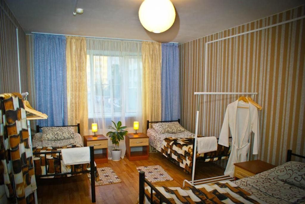 Трехместный (Бюджетный трехместный номер с общей ванной комнатой) отеля Эврика, Краснодар